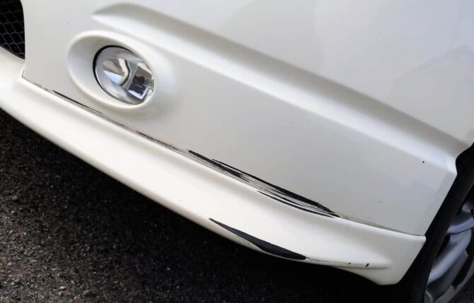Deep car scratches, like those pictured here, are impossible to hide, and typically require body work repair, followed by a layer of fresh paint and clear coat. Photo Credit: Micah Wright