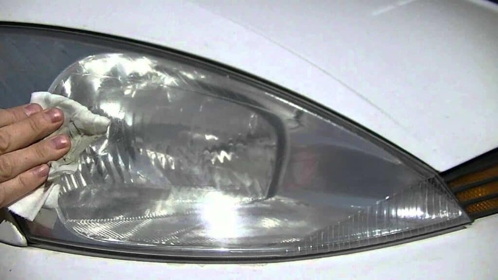Glass cleaner and automotive polish applied to clean headlights