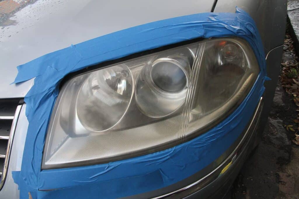 Cleaning headlights with toothpaste to clear out contaminants
